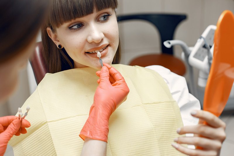 woman-dental-chair-girl-chooses-implant-beauty-treats-her-teeth.jpg